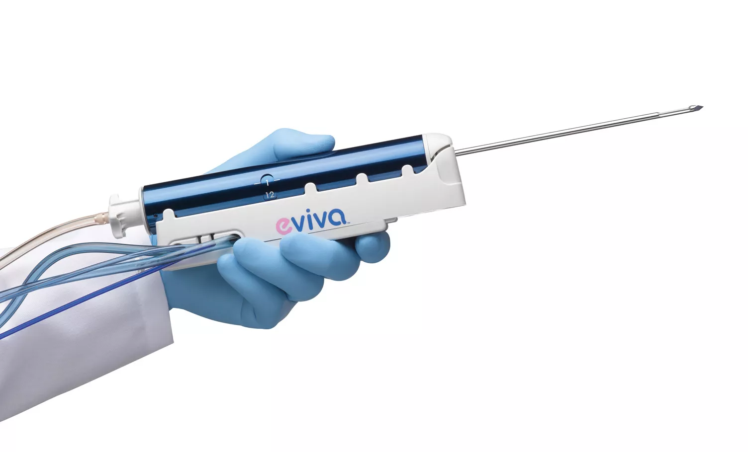 Gloved hand holding a breast Biopsy Needle